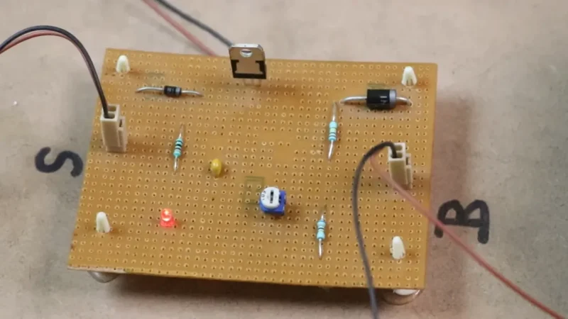 Hands-on solar inverter model demonstrating DC to AC conversion using solar panels and an inverter circuit.