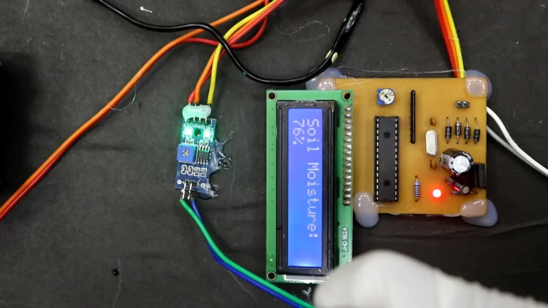 Remote Farm Management prototype with wireless control, moisture monitoring, and integrated security features
